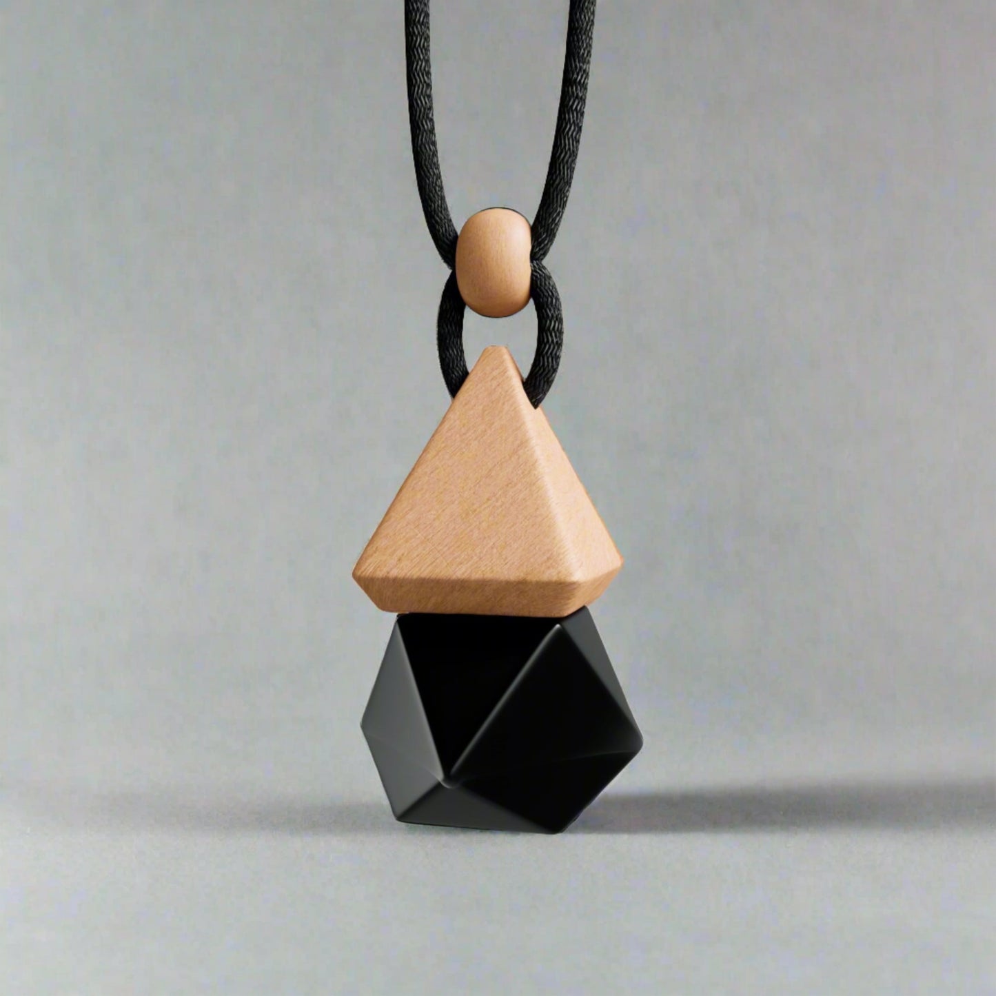 Black colour pendant glass bottle with wooden top.